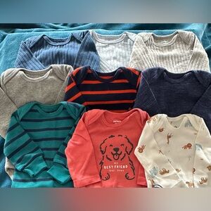 Set of nine 0-3 months long sleeved onesies